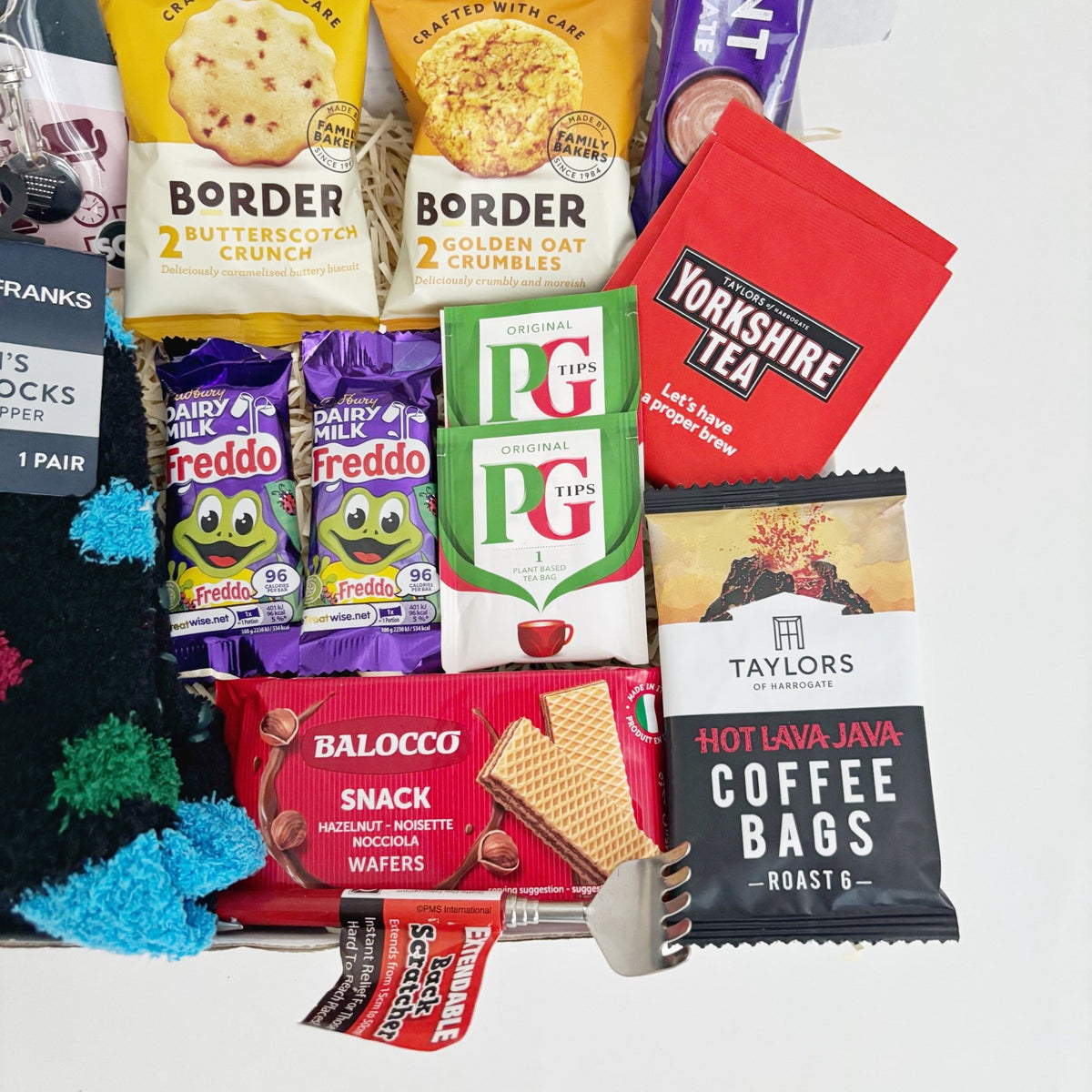 Christmas Gifts for Men Who Have Everything – Cosy Socks & Treat Hamper - WahooGifts